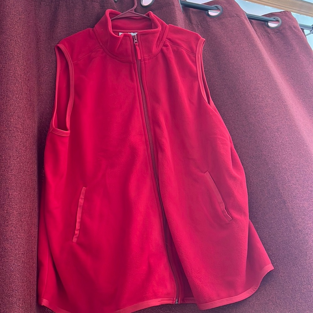 Women’s red fleece vest… does not have tags, but never been worn